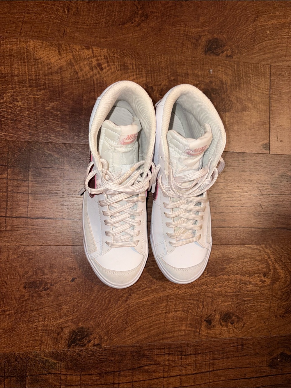 Nike Women’s Mid-Top Sneakers in Pale Pink and White